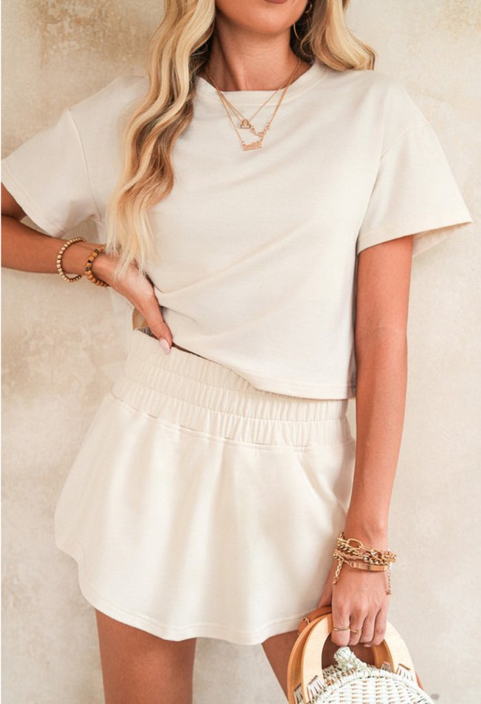 Shewin Inc Cropped Tee and Ruffle High Waist Skort Set-Beige